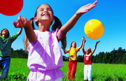 Kids playing with balloons