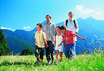 A family is hiking in the mountains   