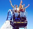 People enjoying a rollercoaster ride