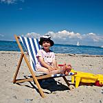 Child sitting on the beach