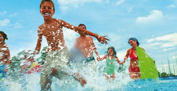 Happy children playing in fun pools