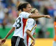 Celia Okoyino da Mbabi and Martina Mueller celebrate a goal - Copyright: OK 2011/Fotoagentur Kunz