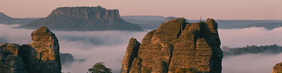 Rathen/Saxon Switzerland: Bastei bridge in the Hohenstein-Rathen rocky landscape with Mount Lilienstein (most significant table mountain in the Elbe Sandstone Massif)