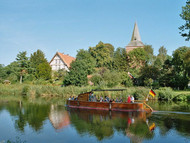 Cruise boat in front of Berkenthin Church. Photo Fred Grochowsky