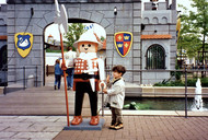 A knight stands guard outside the moat in the Playmobil Fun Park