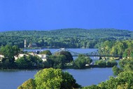 A scenic view of a lake nestled in the landscape