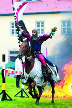 Rider in chain mail at a medieval tournament