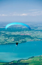 Paraglider over Lake Füssen