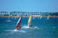 Windsurfing at one of Schleswig-Holsteins' camping sites - Photo: Camping- und Ferienpark Wulfener Hals