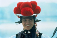 Woman wearing traditional pom-pom hat