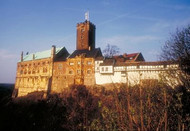 View of Wartburg Castle near Eisenach lit up by the evening sun