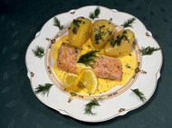 Fish dish with potatoes and dill garnish