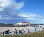 Pier with wicker beach chairs