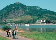 Two cyclists on the cycle path along the Rhine