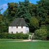 Goethe summer house with lawn and leafy trees